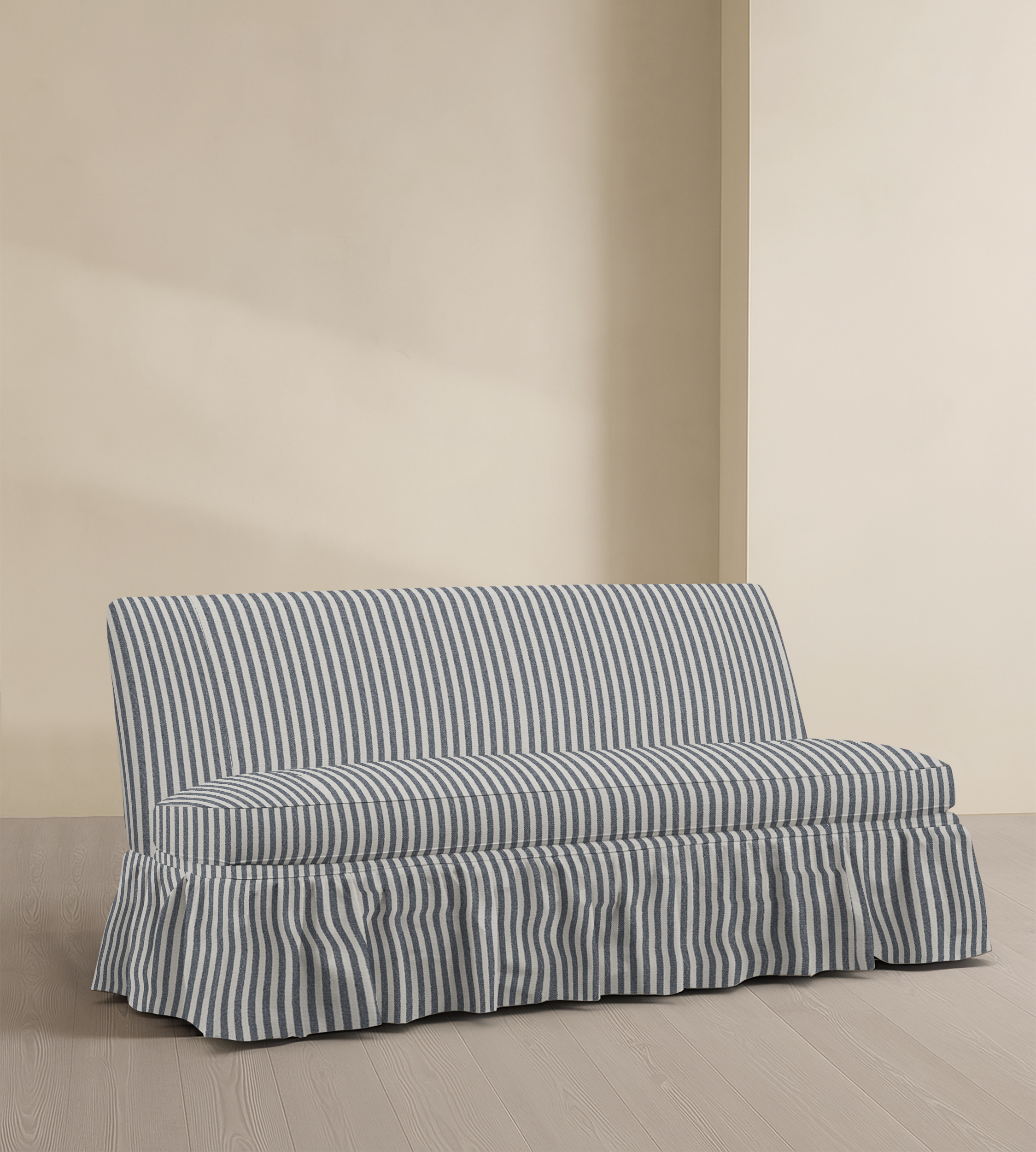 The Belgravia – 68" Ruffle Skirted Armless Sofa