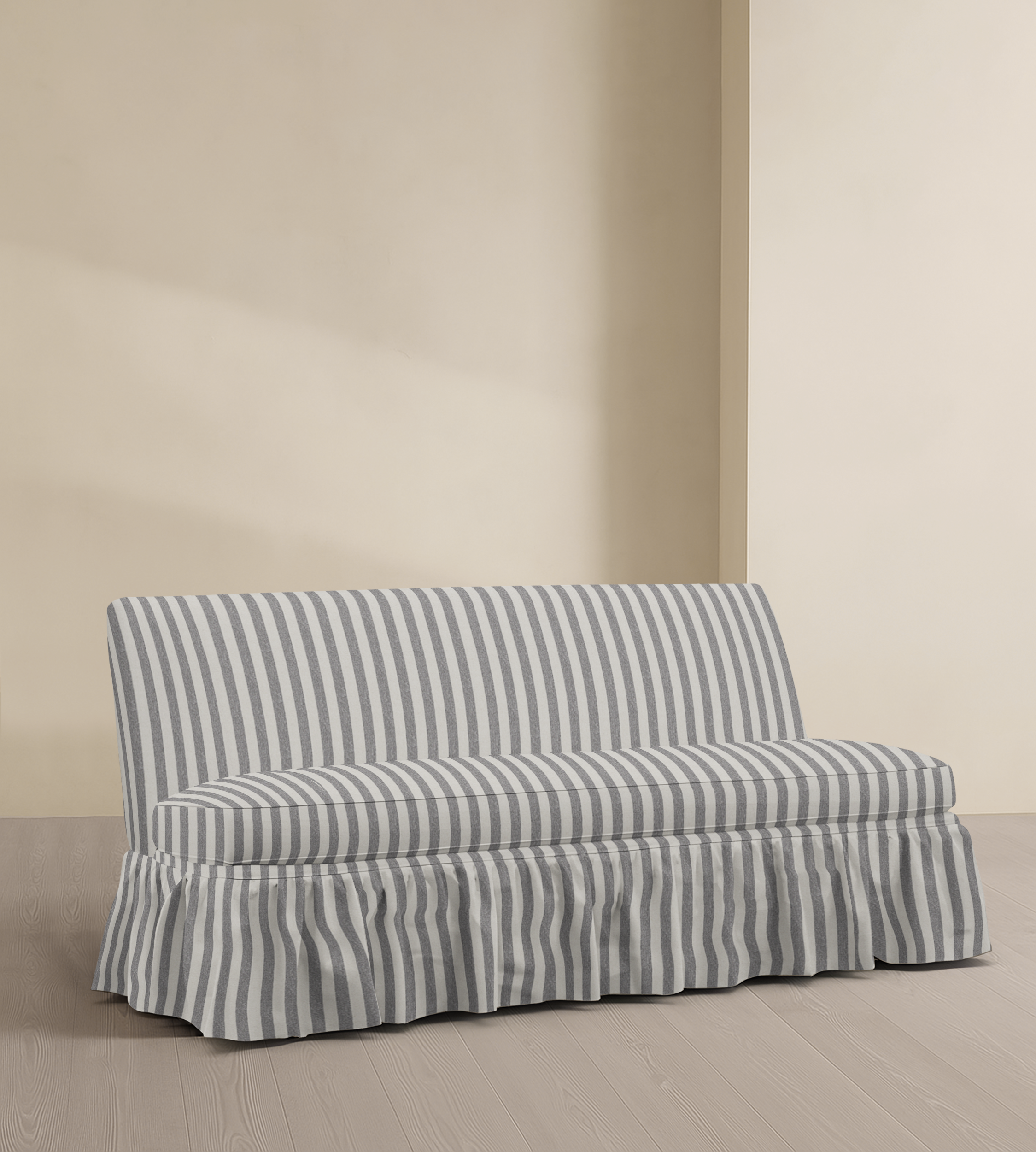 The Belgravia – 68" Ruffle Skirted Armless Sofa