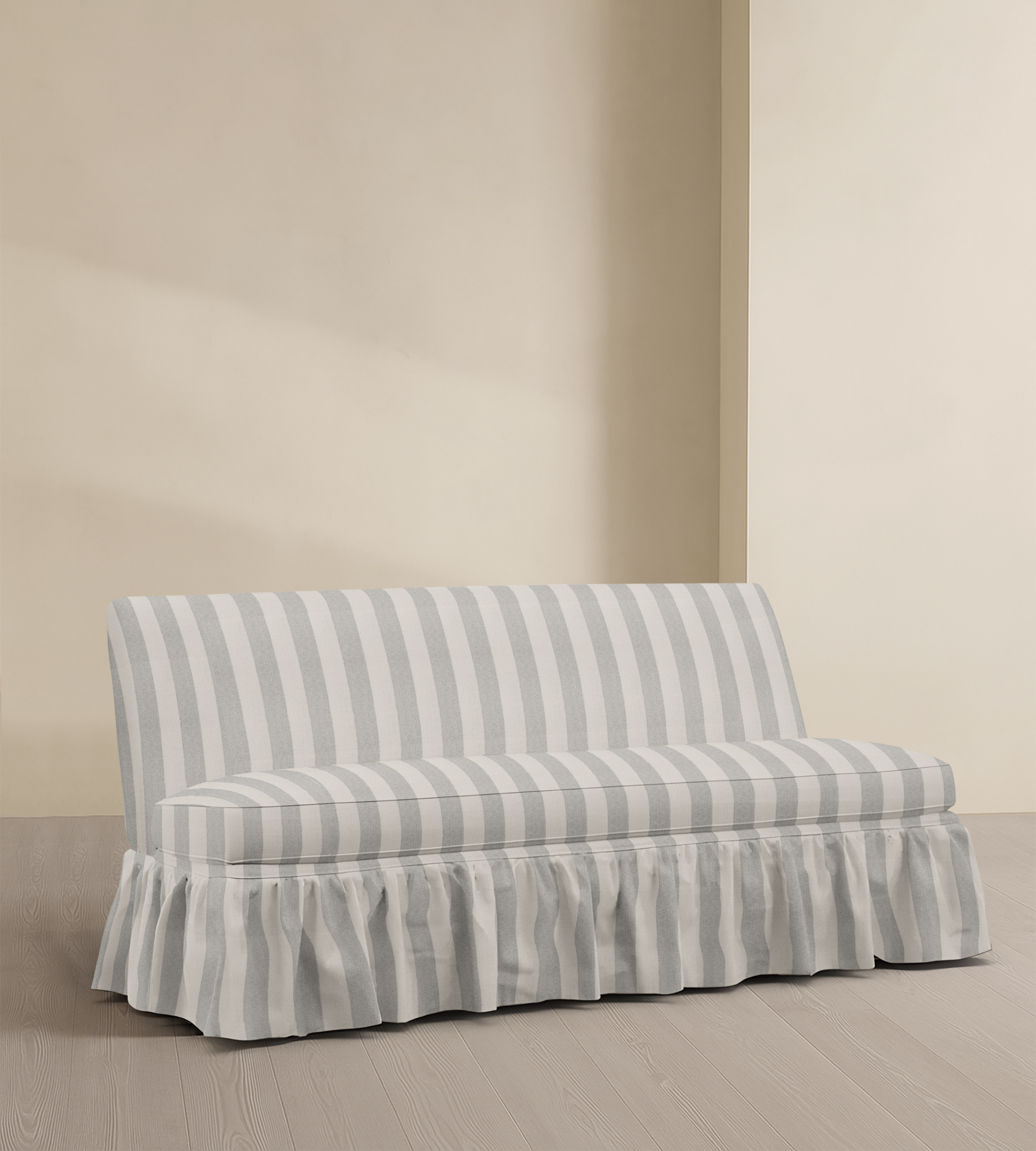 The Belgravia – 68" Ruffle Skirted Armless Sofa
