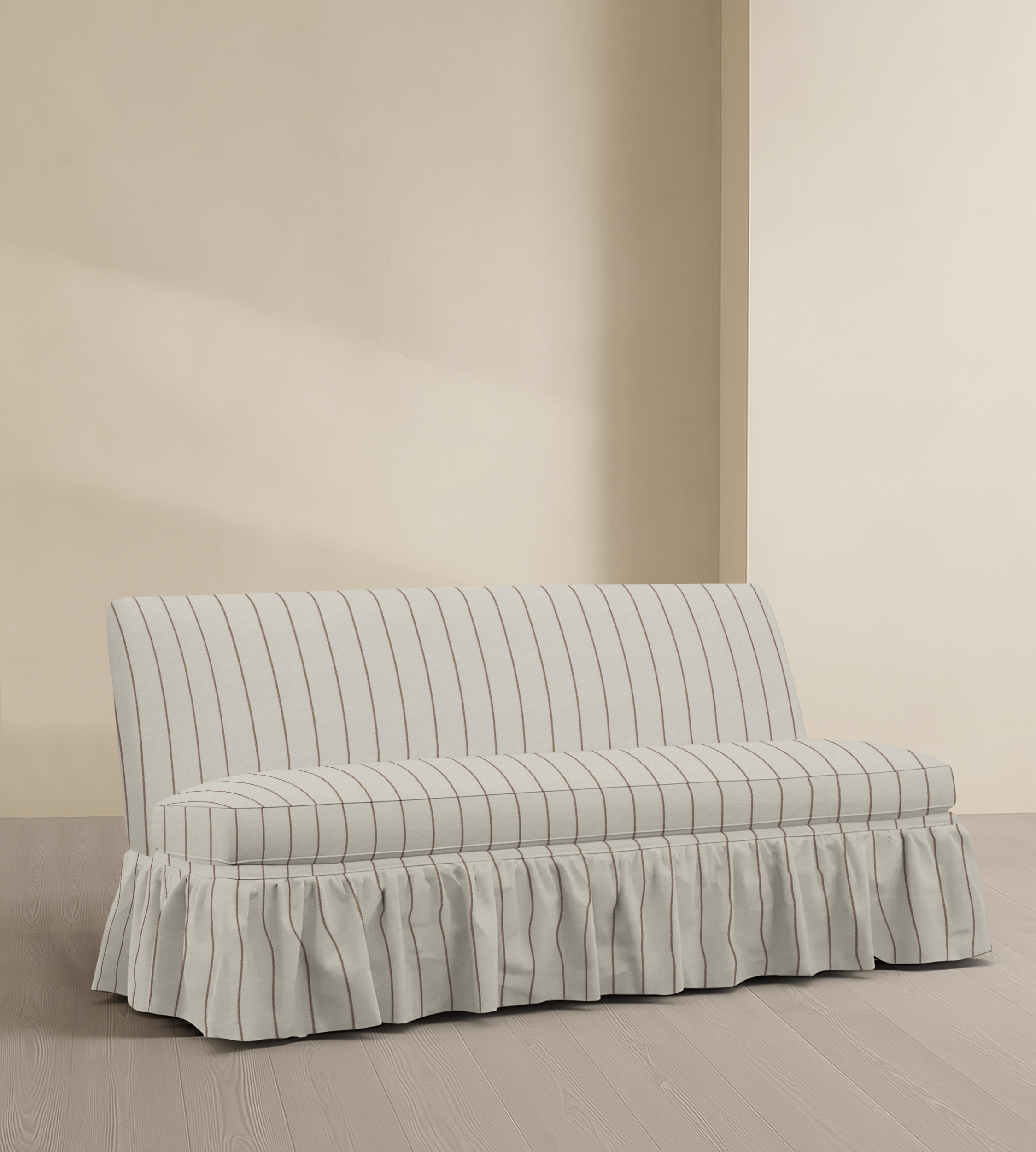 The Belgravia Armless Skirted Sofa